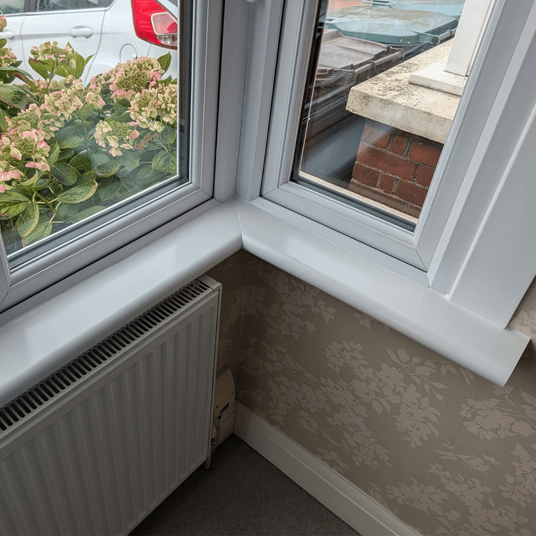 Close up of finished PVC window board corner joint in Gravesend