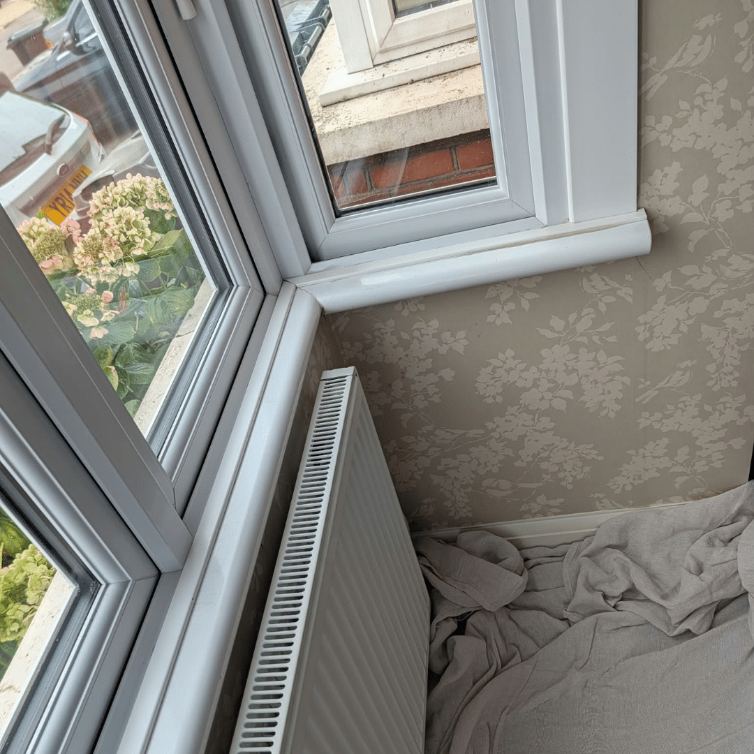 Old window board before uPVC window sill replacement in Gravesend Kent